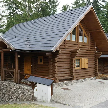 Drevenica Alpesi faház Dóval